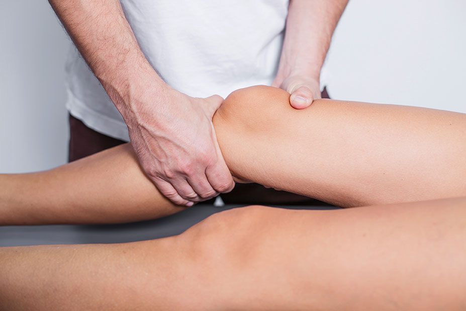 lomi lomi Professional leg and knee massage in studio.